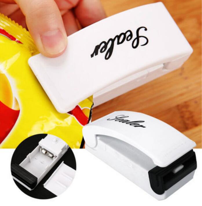 Machine à emballer de capsule portable