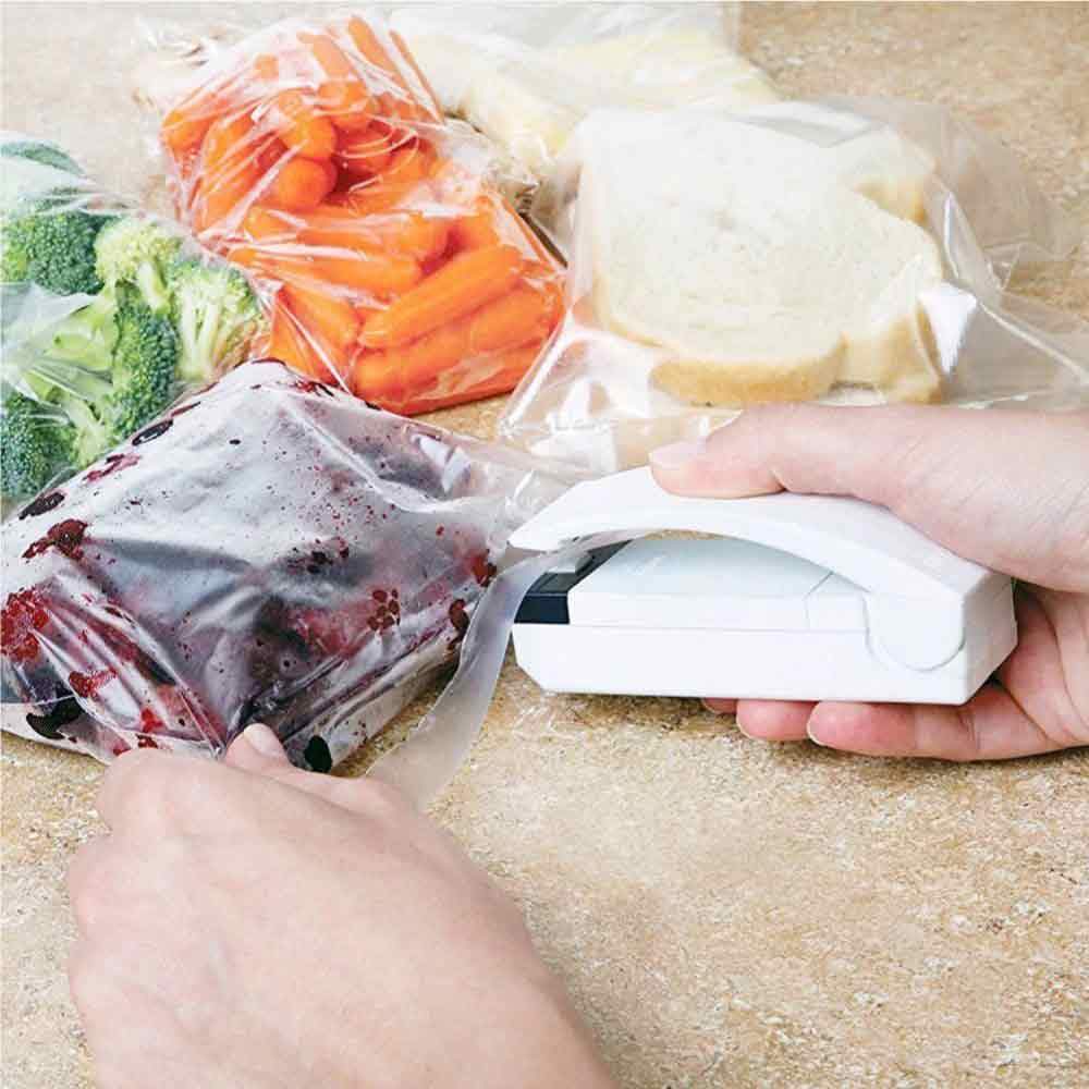 Machine à emballer de capsule portable